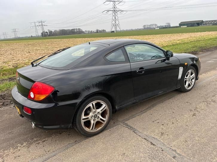Occasion Hyundai Coupé Dynamiq 143 PK (105 kW) 2005 Zwart Coupé
