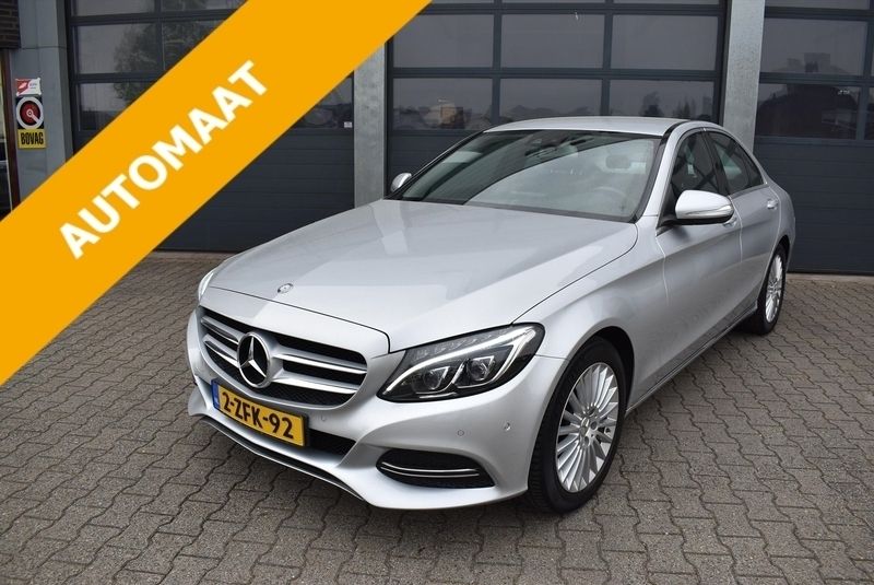 Grijs Gebruikt 2015 Mercedes C180 Ambition Sedan | € 21.830 (Eerlijke prijs) - Afbeelding 1/4