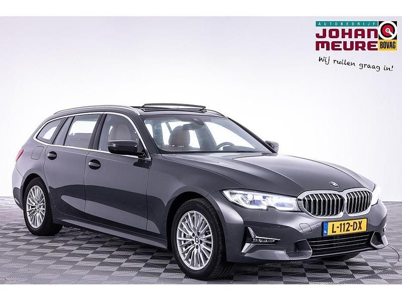 Grijs Gebruikt 2021 BMW 330 Executive Stationwagen | € 32.890 (Goede deal) - Afbeelding 1/4