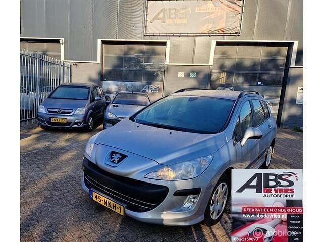 Grijs Gebruikt 2010 Peugeot 308 Stationwagen | € 1.399 (Eerlijke prijs) - Afbeelding 1/4
