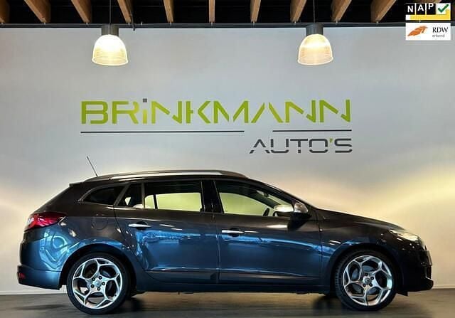 Grijs Gebruikt 2010 Renault Mégane GrandTour GT Stationwagen | € 7.495 (Duur) - Afbeelding 1/4