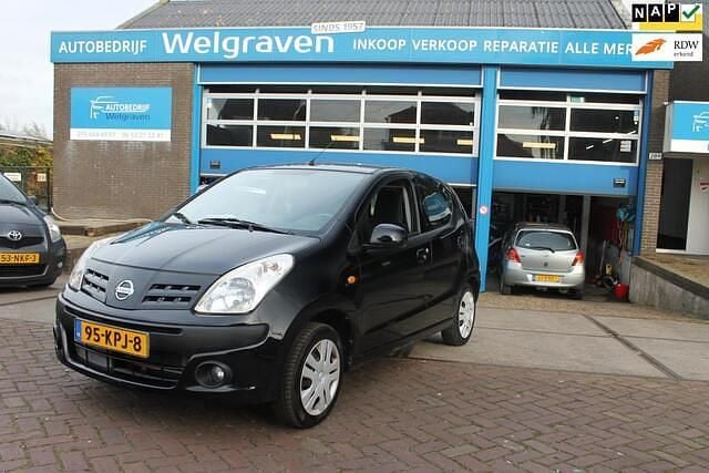 Zwart Gebruikt 2010 Nissan Pixo Acenta Hatchback | € 3.975 (Eerlijke prijs) - Afbeelding 1/4