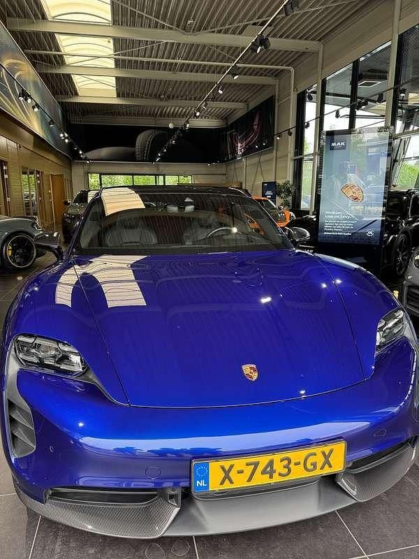 Occasion Porsche Taycan 92 kW (126 PK) 2023 Blauw Sedan