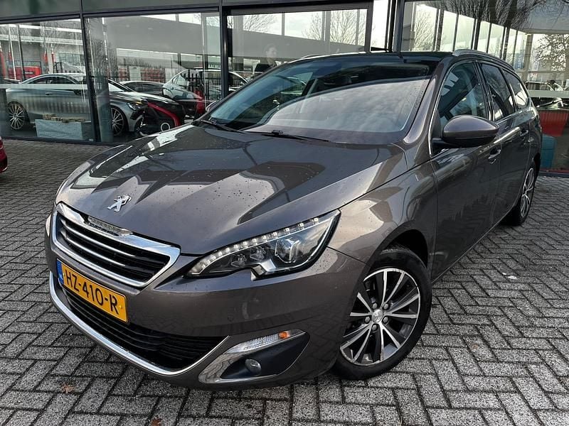 Grijs Occasion 2016 Peugeot 308 Premium Stationwagen | € 5.995 (Goede deal) - Afbeelding 1/4