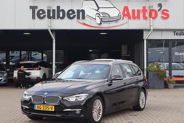 Zwart Gebruikt 2019 BMW 320 Luxury Line Stationwagen | € 17.895 - Afbeelding 1/4