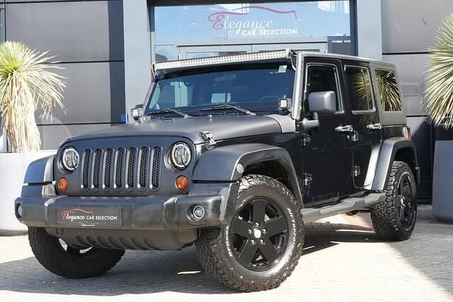 Zwart Gebruikt 2011 Jeep Wrangler Sport SUV | € 19.950 - Afbeelding 1/4