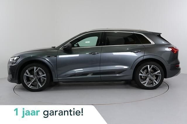 Grijs Gebruikt 2020 Audi e-tron S-Line SUV | € 33.950 (Eerlijke prijs) - Afbeelding 1/4