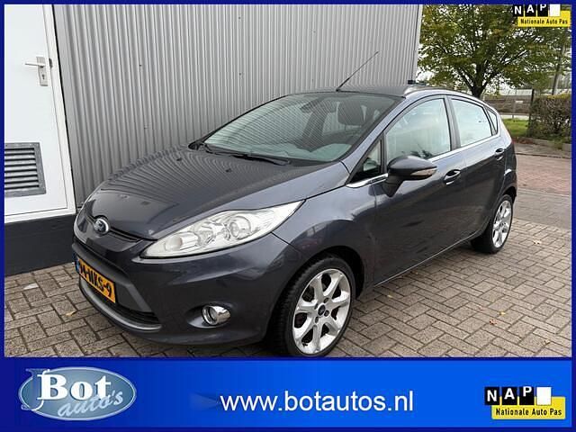 Grijs Occasion 2010 Ford Fiesta Titanium Hatchback | € 3.950 (Eerlijke prijs) - Afbeelding 1/4