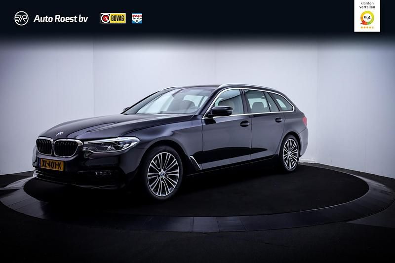 Zwart Gebruikt 2019 BMW 520 Executive Stationwagen | € 29.925 (Eerlijke prijs) - Afbeelding 1/4
