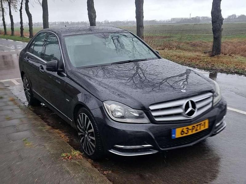 Occasion Mercedes C180 120 PK (88 kW) 2011 Zwart Sedan