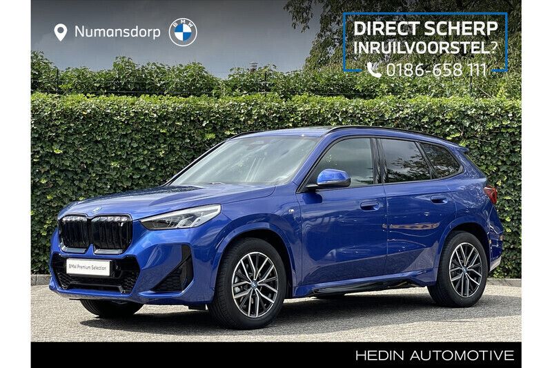 Blauw, metallic lak Gebruikt 2024 BMW iX1 M Sport SUV | € 43.895 (Eerlijke prijs) - Afbeelding 1/3
