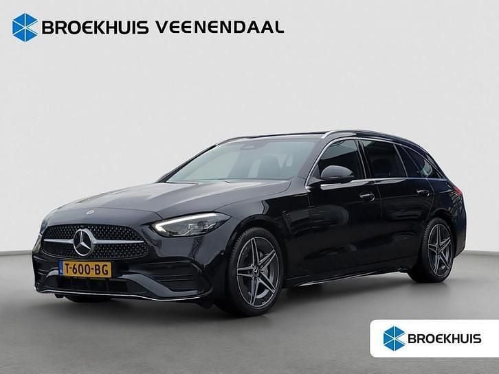 Zwart Occasion 2022 Mercedes C180 AMG line Stationwagen | € 32.900 (Super prijs) - Afbeelding 1/4