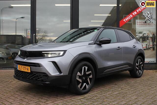 Grijs Gebruikt 2024 Opel Mokka SUV | € 20.945 (Eerlijke prijs) - Afbeelding 1/4