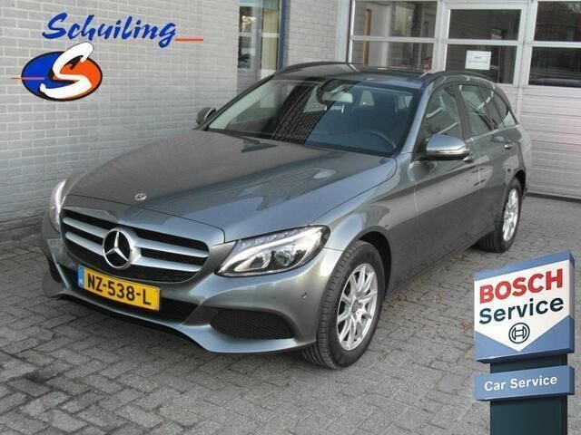 Grijs, metallic lak Gebruikt 2017 Mercedes C160 Premium Coupé | € 18.775 (Iets duurder) - Afbeelding 1/4