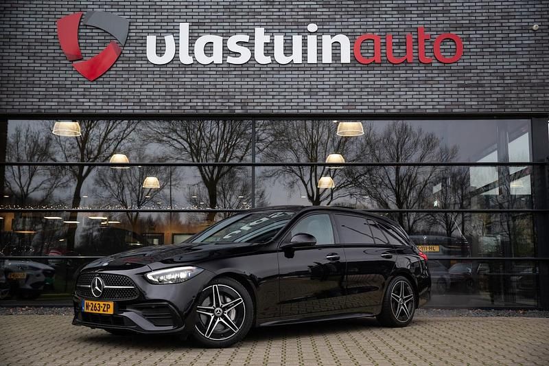 Zwart Occasion 2022 Mercedes C200 AMG line Stationwagen | € 38.950 (Iets duurder) - Afbeelding 1/4