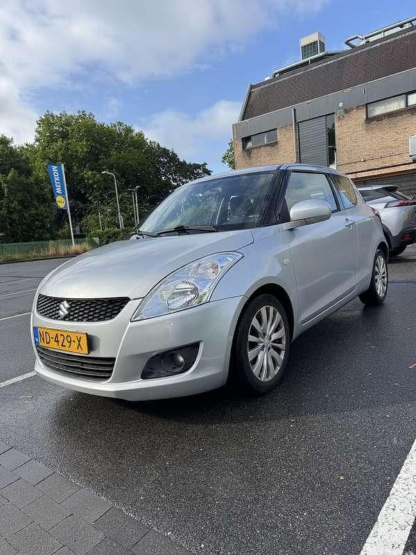 Grijs Gebruikt 2011 Suzuki Swift Hatchback | € 4.500 (Eerlijke prijs) - Afbeelding 1/4