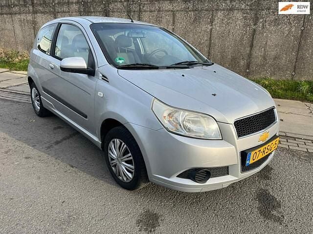 Grijs Occasion 2011 Chevrolet Aveo LS Hatchback | € 1.499 (Eerlijke prijs) - Afbeelding 1/4