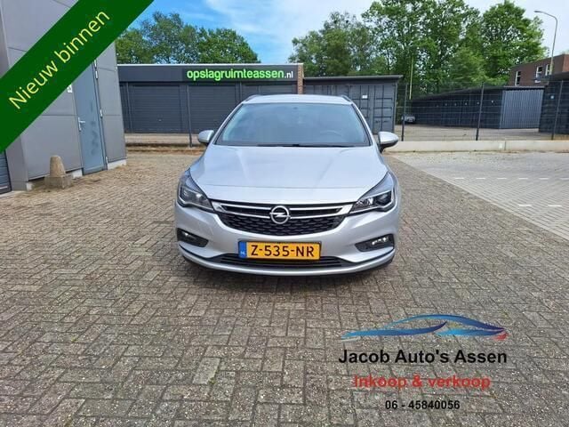 Grijs Gebruikt 2018 Opel Astra Stationwagen | € 9.750 (Iets duurder) - Afbeelding 1/4