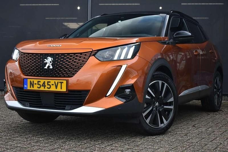 Oranje Gebruikt 2021 Peugeot e-2008 GT SUV | € 16.900 (Goede deal) - Afbeelding 1/4