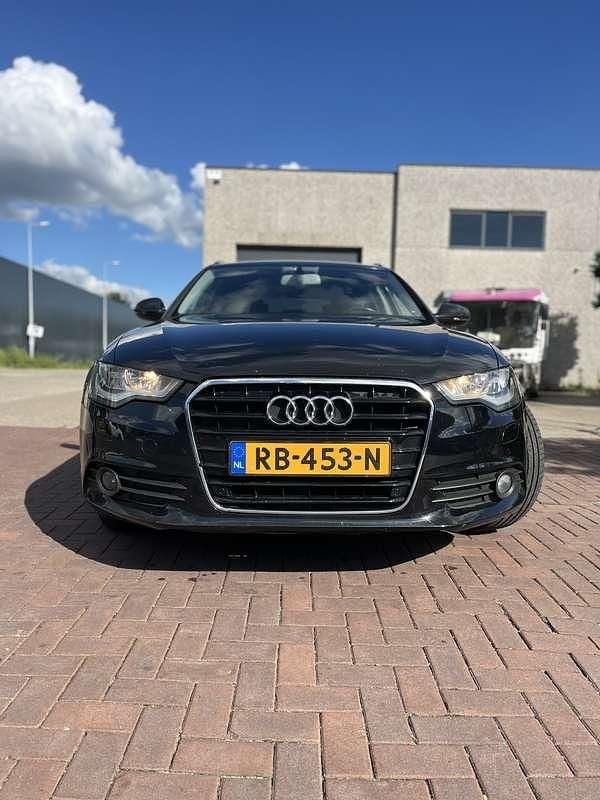 Zwart Gebruikt 2013 Audi A6 Stationwagen | € 9.000 - Afbeelding 1/4