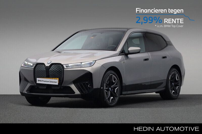 Grijs Gebruikt 2024 BMW iX Executive SUV | € 79.880 (Eerlijke prijs) - Afbeelding 1/4