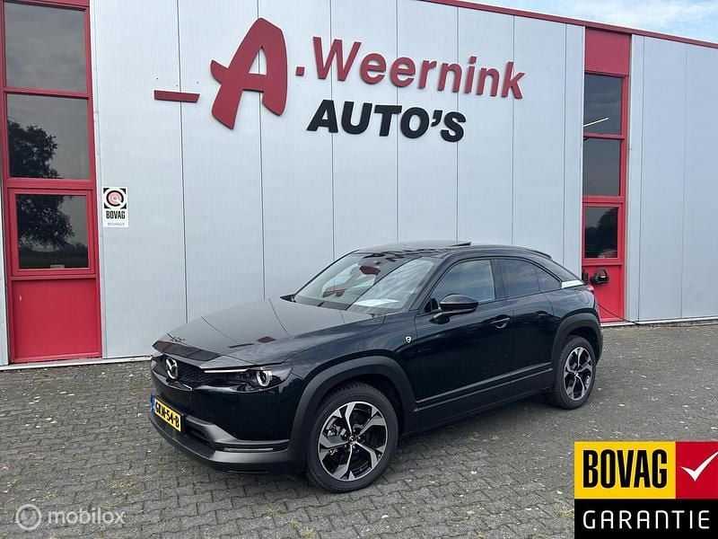 Zwart Gebruikt 2023 Mazda MX30 Makoto SUV | € 25.950 (Goede deal) - Afbeelding 1/4