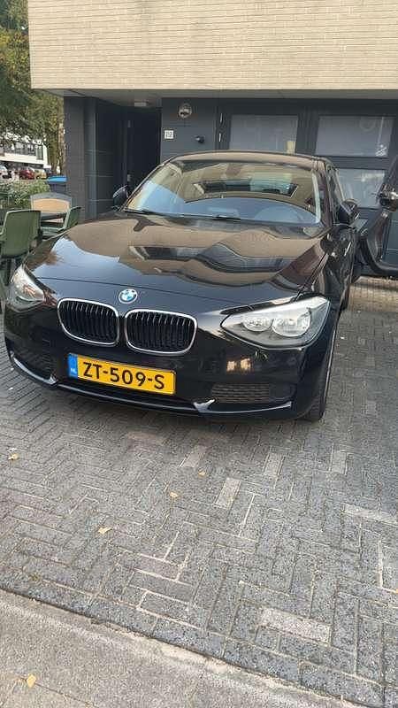 Zwart Gebruikt 2013 BMW 116 Executive Hatchback | € 6.950 (Goede deal) - Afbeelding 1/3
