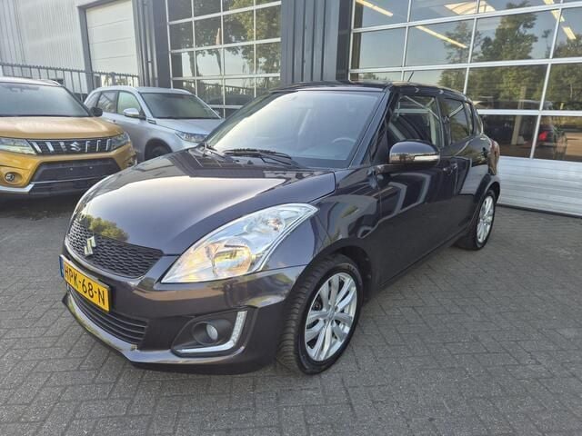Paars Gebruikt 2014 Suzuki Swift Exclusive Hatchback | € 9.750 (Eerlijke prijs) - Afbeelding 1/4