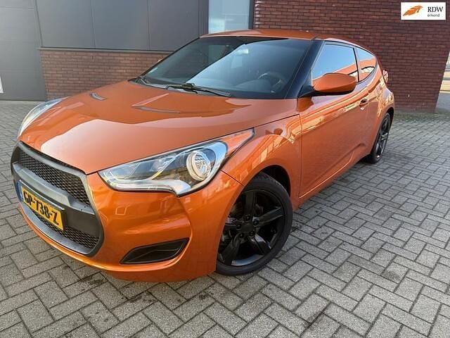 Oranje Occasion 2014 Hyundai Veloster Edition Hatchback | € 6.900 (Super prijs) - Afbeelding 1/4