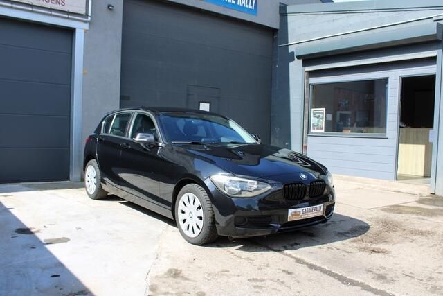 Zwart Gebruikt 2014 BMW 114 Hatchback | € 10.500 (Eerlijke prijs) - Afbeelding 1/4