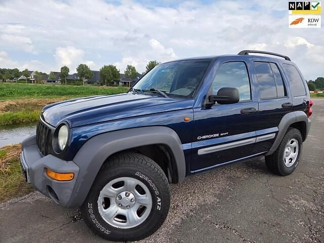 Blauw Gebruikt 2003 Jeep Cherokee Sport SUV | € 5.250 (Goede deal) - Afbeelding 1/4