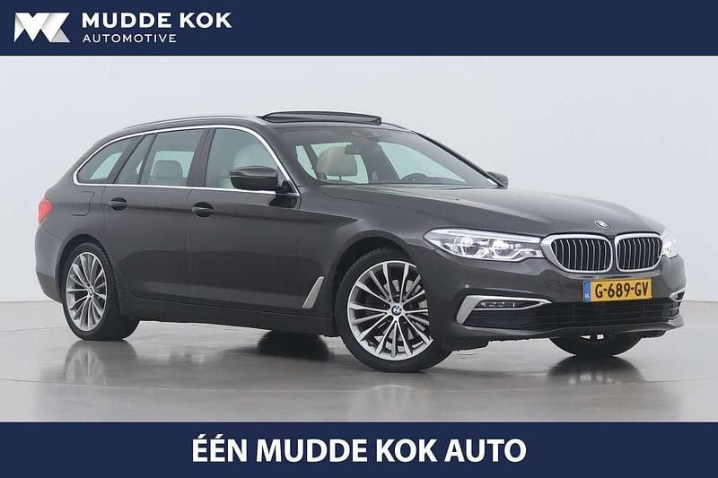 Bruin, metallic lak Gebruikt 2019 BMW 520 Comfort Edition Stationwagen | € 27.400 (Goede deal) - Afbeelding 1/4