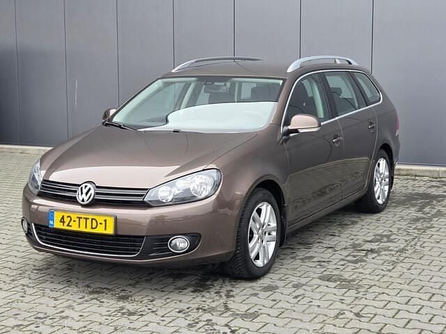 Bruin Gebruikt 2012 VW Golf VII Highline Stationwagen | € 5.900 (Super prijs) - Afbeelding 1/3