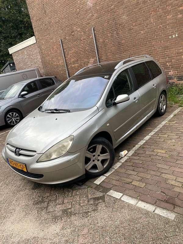 Grijs Gebruikt 2004 Peugeot 307 Stationwagen | € 950 (Eerlijke prijs) - Afbeelding 1/4