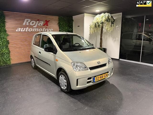 Beige (metallic) Occasion 2004 Daihatsu Cuore Hatchback | € 2.899 (Duur) - Afbeelding 1/4