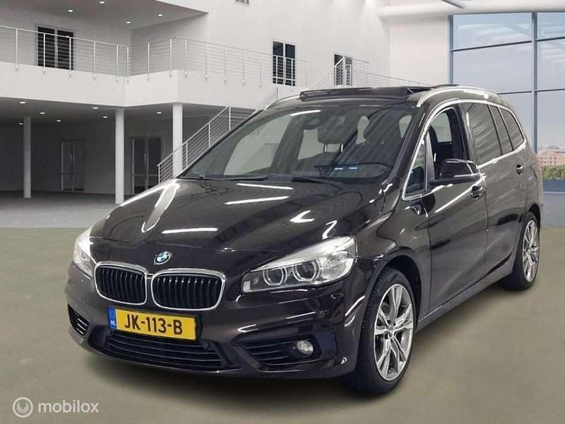 Bruin Occasion 2016 BMW 218 Gran Tourer MPV | € 9.950 (Iets duurder) - Afbeelding 1/4