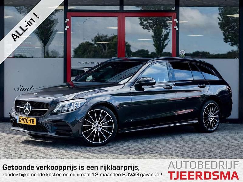 Grijs Gebruikt 2021 Mercedes C300e AMG Stationwagen | € 27.950 (Eerlijke prijs) - Afbeelding 1/4