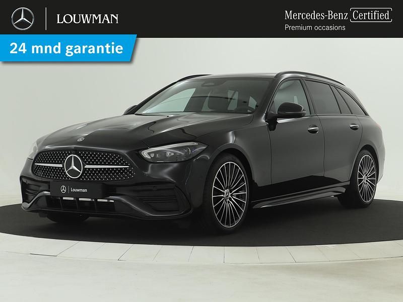 Zwart, metallic lak Occasion 2024 Mercedes C200 AMG line Stationwagen | € 51.995 (Duur) - Afbeelding 1/4