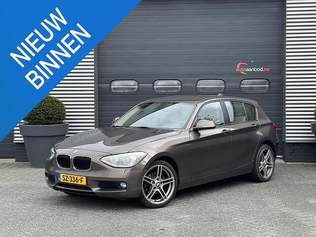 Bruin Gebruikt 2014 BMW 116 Executive Hatchback | € 7.440 (Goede deal) - Afbeelding 1/4