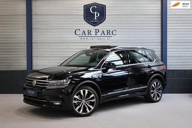 Zwart Gebruikt 2018 VW Tiguan R-line SUV | € 28.995 (Eerlijke prijs) - Afbeelding 1/4