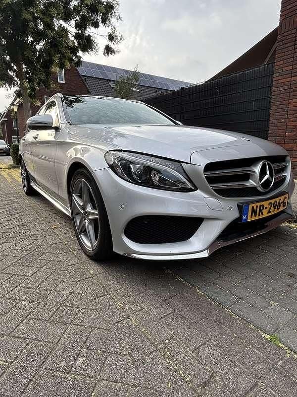 Grijs Gebruikt 2017 Mercedes C180 AMG Stationwagen | € 16.999 (Super prijs) - Afbeelding 1/4