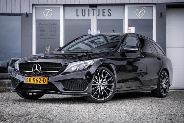Zwart Gebruikt 2018 Mercedes C180 AMG Stationwagen | € 24.900 (Eerlijke prijs) - Afbeelding 1/4