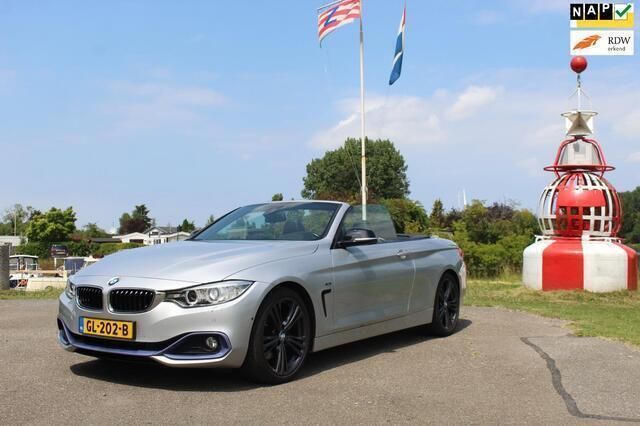 Grijs, metallic lak Gebruikt 2015 BMW 428 Executive Cabriolet | € 23.495 (Goede deal) - Afbeelding 1/4