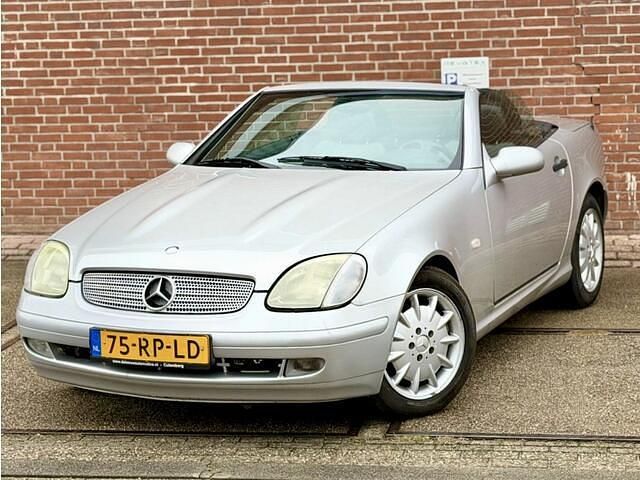 Grijs Gebruikt 1997 Mercedes SLK230 Cabriolet | € 4.750 (Duur) - Afbeelding 1/4