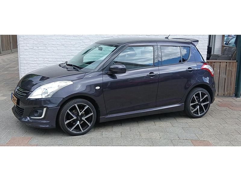 Paars Gebruikt 2016 Suzuki Swift Hatchback | € 11.499 (Duur) - Afbeelding 1/4