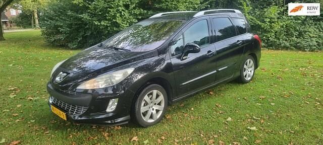 Zwart Gebruikt 2010 Peugeot 308 Stationwagen | € 1.950 (Eerlijke prijs) - Afbeelding 1/4