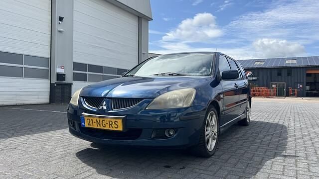 Blauw Gebruikt 2003 Mitsubishi Lancer Stationwagen | € 500 (Goede deal) - Afbeelding 1/4