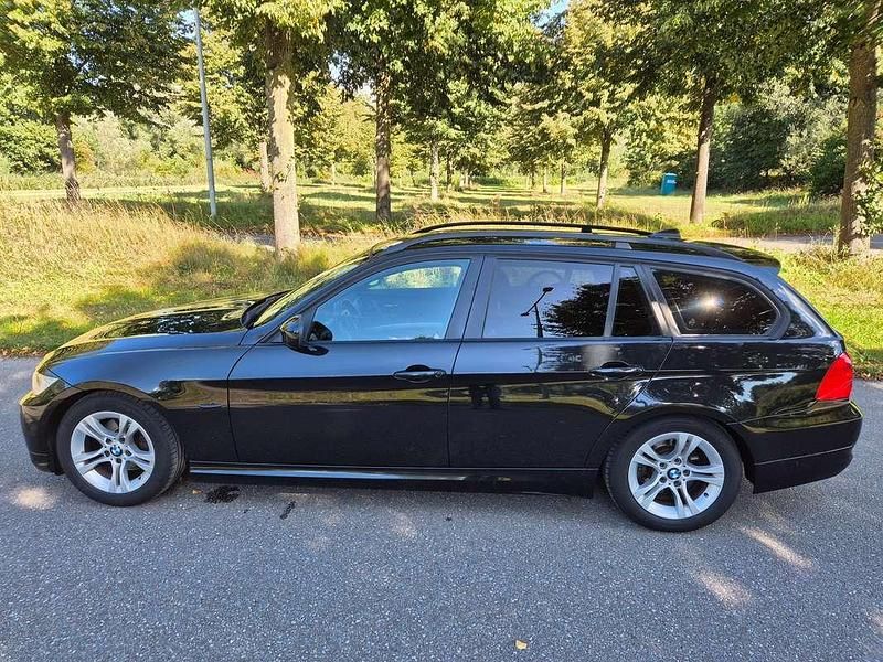 Zwart Gebruikt 2010 BMW 316 Stationwagen | € 4.499 (Eerlijke prijs) - Afbeelding 1/4