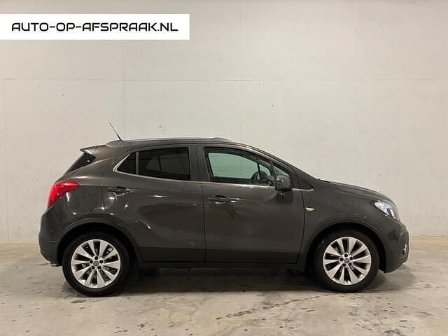 Grijs Gebruikt 2015 Opel Mokka Cosmo SUV | € 10.999 (Eerlijke prijs) - Afbeelding 1/4