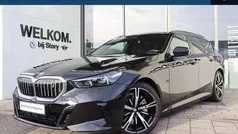 Zwart Gebruikt 2025 BMW i5 Shadowline Stationwagen | € 59.950 (Super prijs)